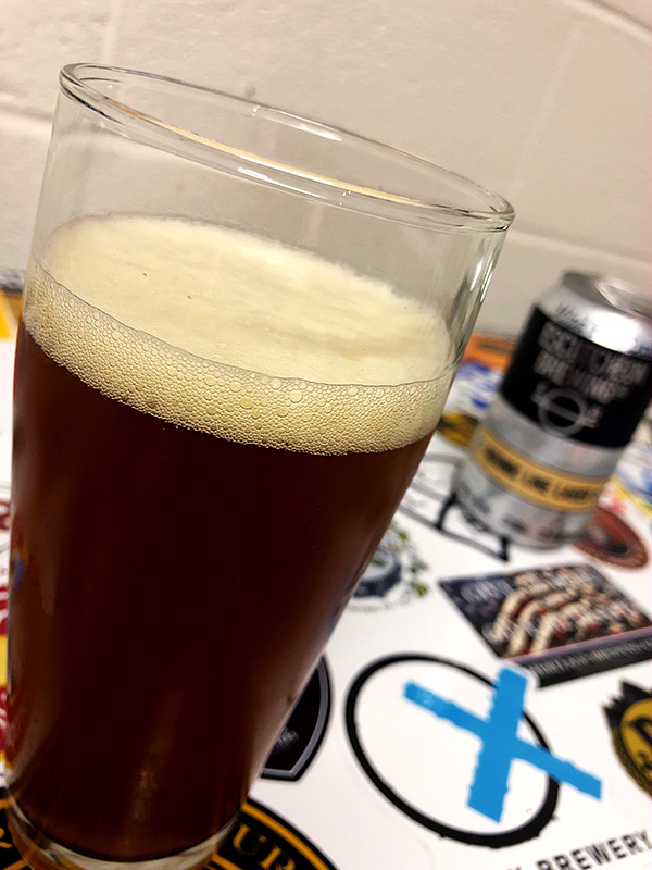 Escutcheon Brewing Agonic Line Lager photo